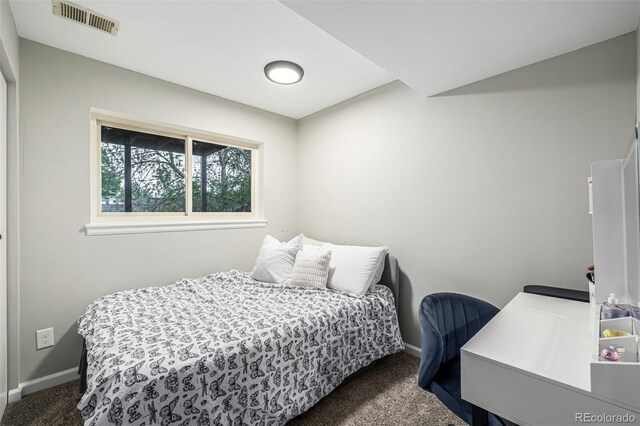19661 E Girard Ave, Aurora, CO 80013 - bedroom with dark colored carpet and baseboards