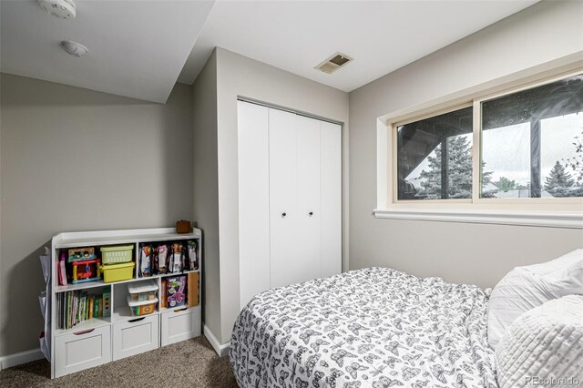19661 E Girard Ave, Aurora, CO 80013 - carpeted bedroom featuring a closet and baseboards