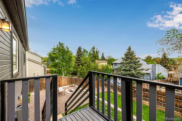 19661 E Girard Ave, Aurora, CO 80013 - view of wooden balcony with an outdoor fire pit, a residential view, and a deck