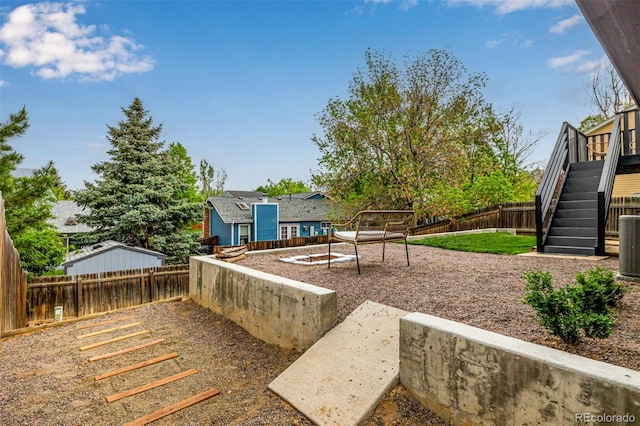 19661 E Girard Ave, Aurora, CO 80013 - fenced backyard featuring stairway