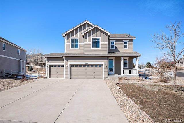 view of front of house with a porch, a garage, a shingled roof, fence, and driveway