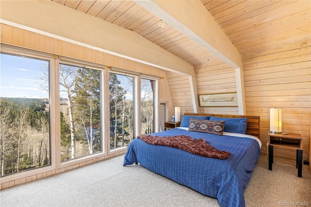 771 Spruce Rd, Cimarron, CO 81220 - carpeted bedroom with wooden walls, vaulted ceiling, and wood ceiling