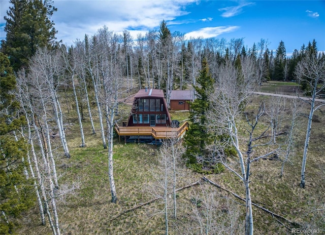 771 Spruce Rd, Cimarron, CO 81220 - rear view of house with a wooden deck and a view of trees