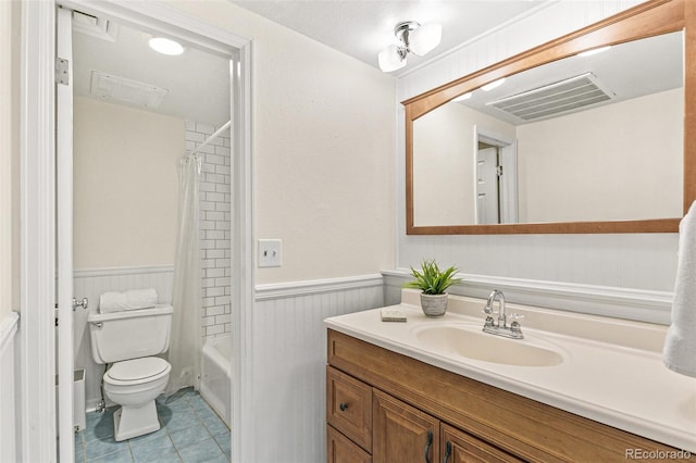 full bathroom featuring tile patterned flooring, vanity, toilet, and shower / bathtub combination with curtain