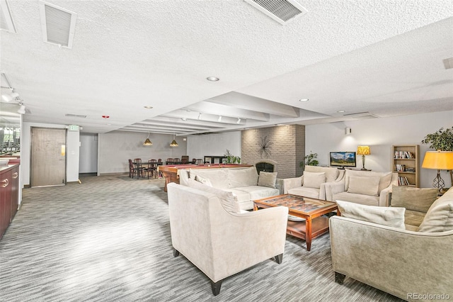 living room with a textured ceiling