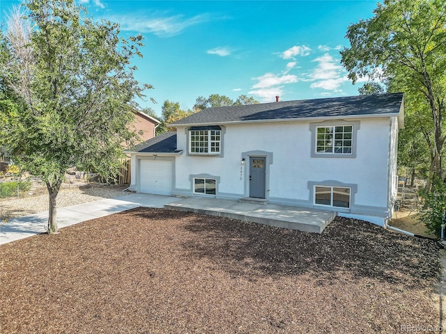 raised ranch with a garage