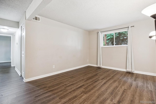 16359 W 10th Ave Unit 2, Golden, CO 80401 - unfurnished room featuring dark wood-style floors and a textured ceiling