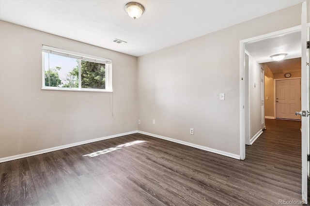 16359 W 10th Ave Unit 2, Golden, CO 80401 - spare room with dark wood-type flooring and baseboards