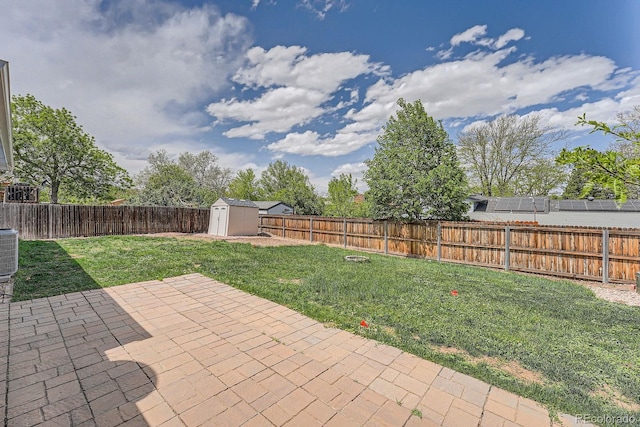 view of patio / terrace with a shed, an outdoor structure, and cooling unit