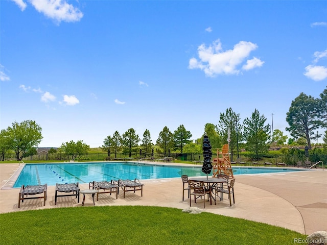5608 Raintree Dr, Parker, CO 80134 - community pool featuring a patio