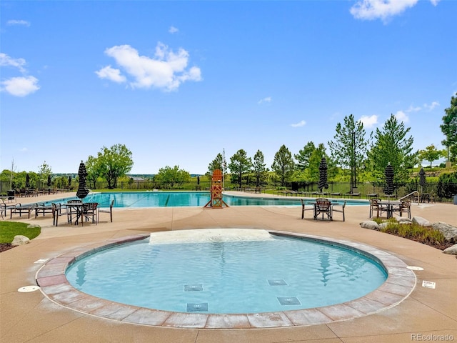 5608 Raintree Dr, Parker, CO 80134 - community pool with a patio