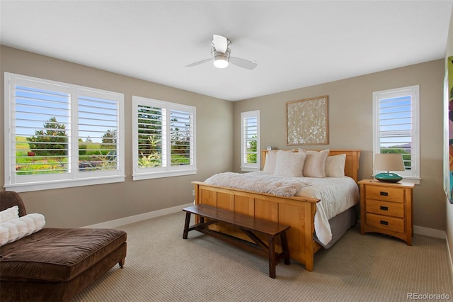 5608 Raintree Dr, Parker, CO 80134 - bedroom with light colored carpet and a ceiling fan