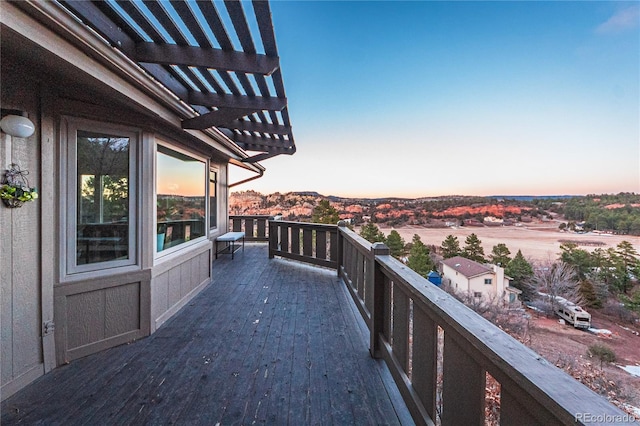 balcony featuring a pergola