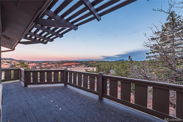 wooden deck with a pergola