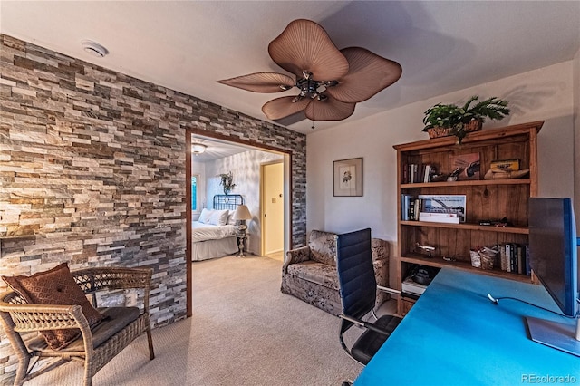 home office with ceiling fan and carpet flooring