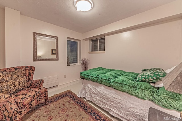 bedroom featuring a textured ceiling