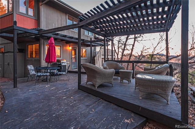 wooden terrace featuring stairs, outdoor dining area, grilling area, and a pergola