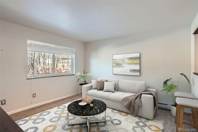 carpeted living area featuring a baseboard radiator and baseboards