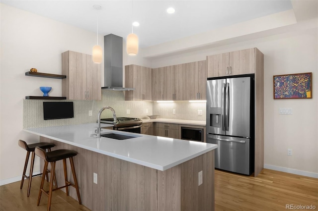 kitchen with open shelves, stainless steel appliances, tasteful backsplash, ventilation hood, and a peninsula