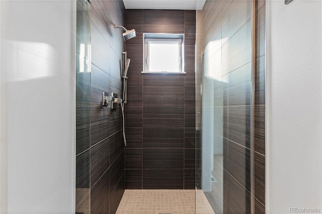 bathroom with a stall shower