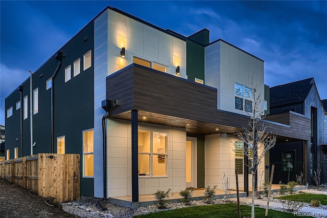 modern home with fence