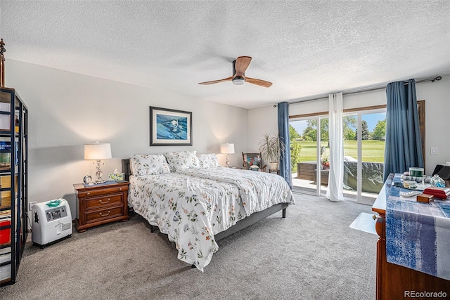 1152 Clubhouse Dr, Broomfield, CO 80020 - bedroom featuring access to exterior, carpet flooring, a textured ceiling, and a ceiling fan