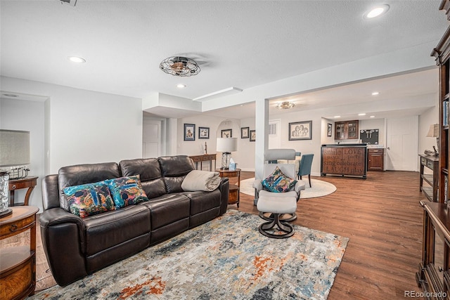 1152 Clubhouse Dr, Broomfield, CO 80020 - living area with wood finished floors, recessed lighting, and bar area