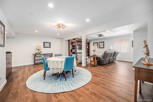 1152 Clubhouse Dr, Broomfield, CO 80020 - dining area with wood finished floors, recessed lighting, and baseboards