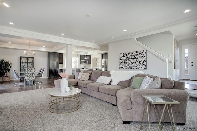 living room with a notable chandelier