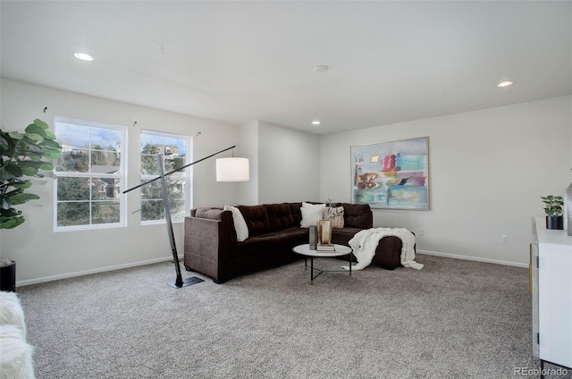 living room featuring light colored carpet