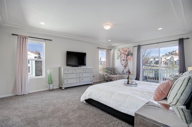 carpeted bedroom featuring multiple windows