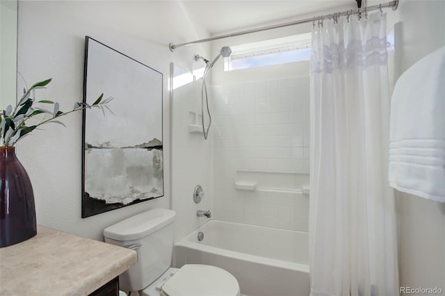 full bathroom featuring vanity, toilet, and shower / tub combo