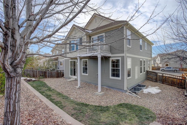 exterior space featuring a balcony