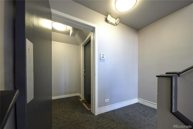 500 E 11th Ave Unit 201, Denver, CO 80203 - hall featuring baseboards and dark colored carpet