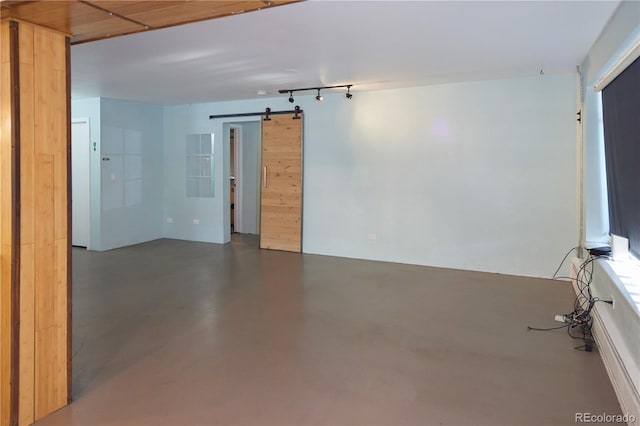 500 E 11th Ave Unit 201, Denver, CO 80203 - spare room with concrete floors and a barn door