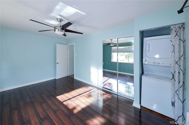 500 E 11th Ave Unit 201, Denver, CO 80203 - empty room with estacked washer and dryer, a ceiling fan, and wood finished floors
