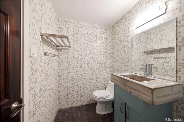 500 E 11th Ave Unit 201, Denver, CO 80203 - bathroom with vanity and tile walls