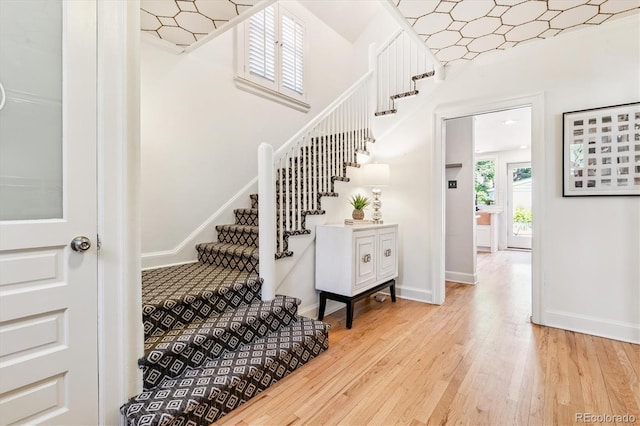 428 N Humboldt St, Denver, CO 80218 - stairs with wood finished floors and baseboards