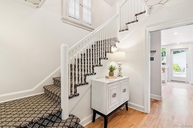 428 N Humboldt St, Denver, CO 80218 - stairway featuring wood finished floors and baseboards