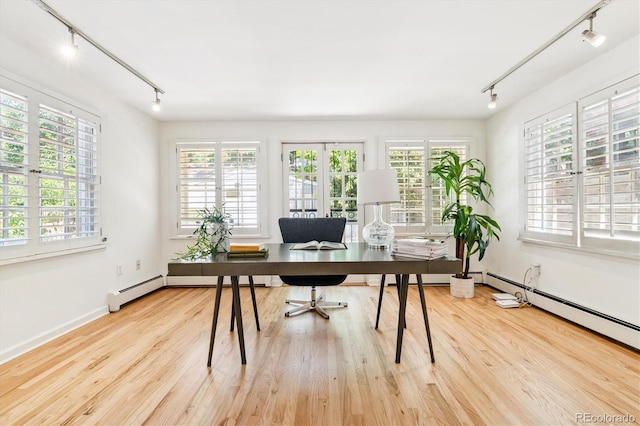428 N Humboldt St, Denver, CO 80218 - office space featuring track lighting, healthy amount of natural light, and wood finished floors