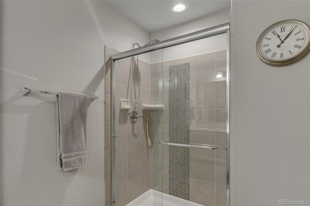 bathroom featuring walk in shower