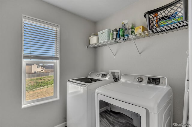 washroom featuring separate washer and dryer