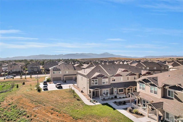 birds eye view of property featuring a mountain view