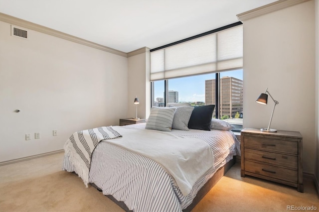 bedroom with ornamental molding