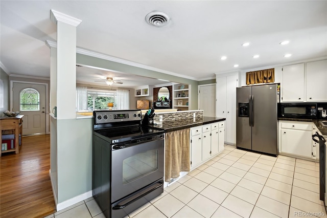 kitchen featuring stainless steel appliances, ornamental molding, white cabinets, dark countertops, and recessed lighting