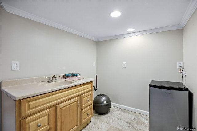bathroom featuring ornamental molding, baseboards, vanity, recessed lighting, and toilet