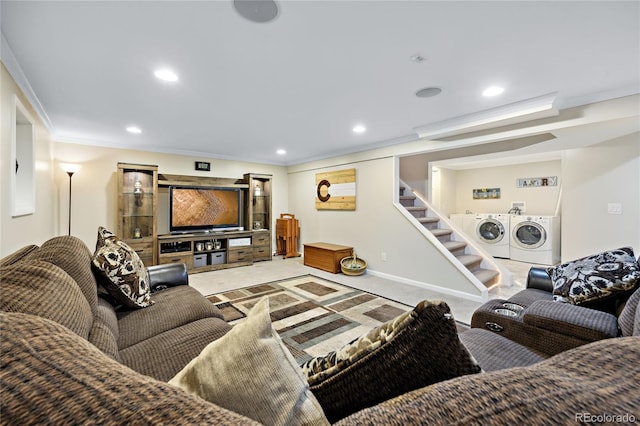 carpeted living area featuring washing machine and clothes dryer, stairway, ornamental molding, and recessed lighting