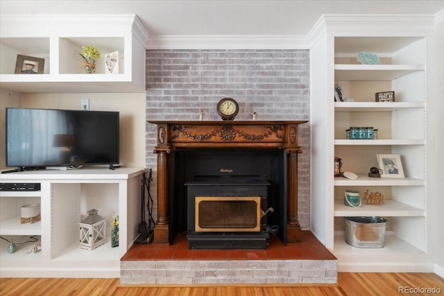 6013 S Logan St, Centennial, CO 80121 - detailed view of wood finished floors and a wood stove