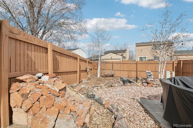 view of yard featuring a fenced backyard