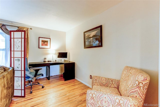 office space featuring light wood-type flooring